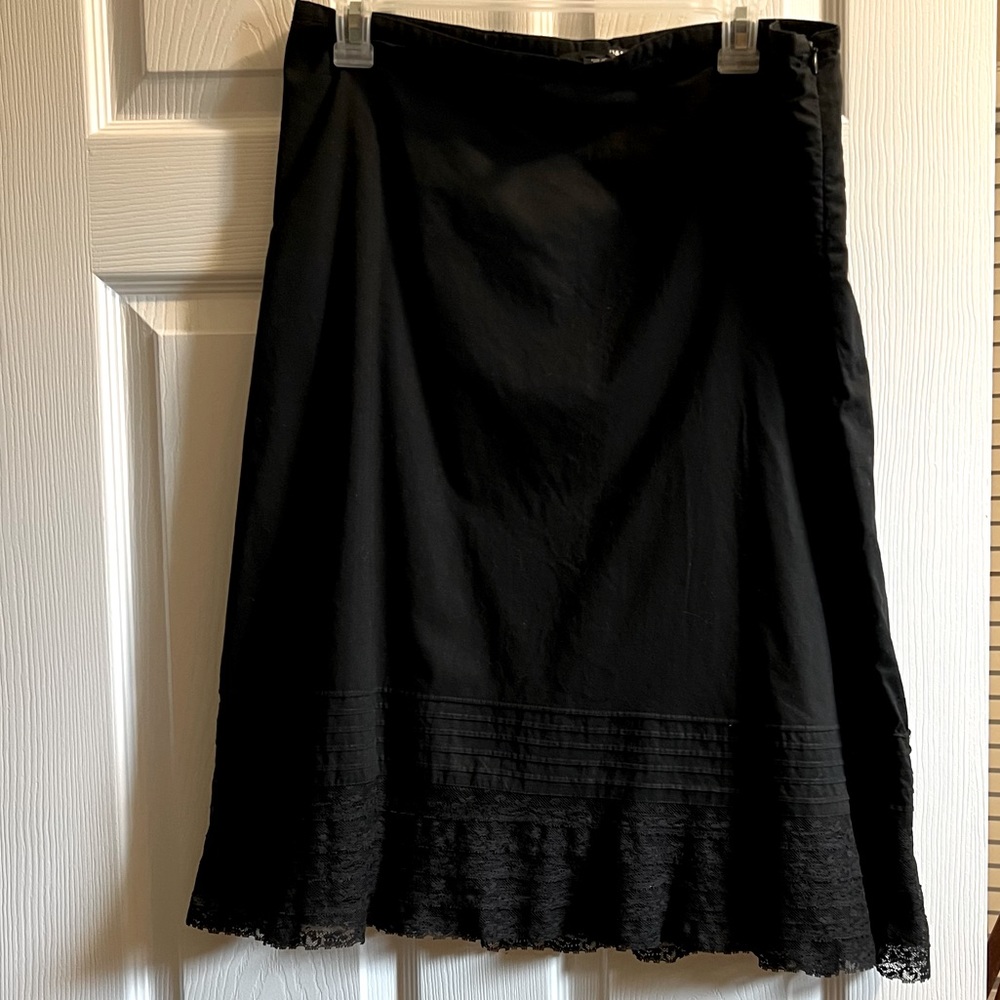 H&M Women’s size 12 black with lace trim skirt.
